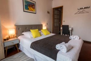 Postel nebo postele na pokoji v ubytování Ma Petite Auberge