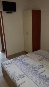 Postel nebo postele na pokoji v ubytování Apartments Babić