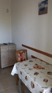 Postel nebo postele na pokoji v ubytování Apartments Babić