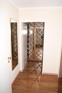a room with a door to a wine cellar at Seeblickstudio 2.33 im Seehof Bansin in Bansin