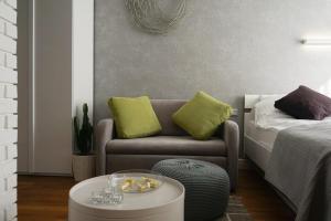 Część wypoczynkowa w obiekcie oompH Koszyki Luxurious Apartments