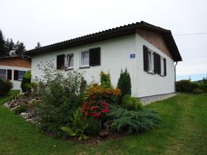 Vonkajšia záhrada v ubytovaní Bungalows Raschun Grabelsdorf Etruskerweg 10 A-9122 St.Kanzian