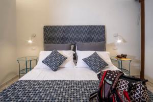 Postel nebo postele na pokoji v ubytování Rosa Magra Guest House