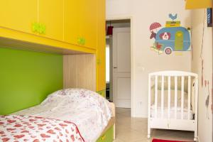 Posteľ alebo postele v izbe v ubytovaní Fellini - Family Flat