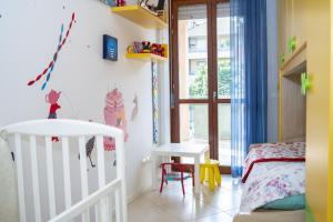Posteľ alebo postele v izbe v ubytovaní Fellini - Family Flat