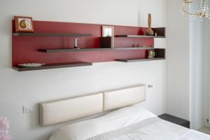 Posteľ alebo postele v izbe v ubytovaní Fellini - Family Flat