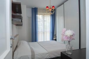 Posteľ alebo postele v izbe v ubytovaní Fellini - Family Flat