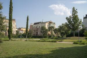 Vonkajšia záhrada v ubytovaní Fellini - Family Flat