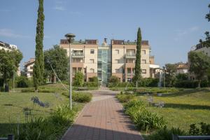 Vonkajšia záhrada v ubytovaní Fellini - Family Flat