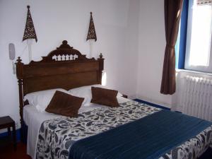 Postel nebo postele na pokoji v ubytování Auberge Cocagne