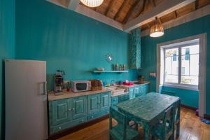 Kuchyň nebo kuchyňský kout v ubytování Santa Maria Hostel + 37 fotografií