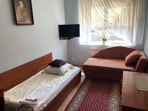 Кровать или кровати в номере U Bosmana