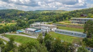 an aerial view of a large building in a field at Hotel Rakovec in Brno