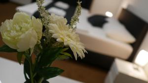 Voodi või voodid majutusasutuse Hotel Bílý Koníček toas