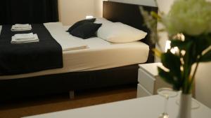 Voodi või voodid majutusasutuse Hotel Bílý Koníček toas