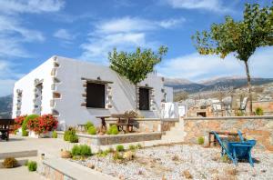 a villa with a view of the mountains at Madares Apartments Anopolis in Anopoli Sfakion