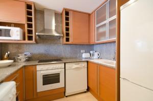 A kitchen or kitchenette at Boadella ATICO - SEAVIEW PENTHOUSE
