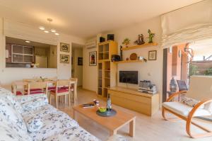 A television and/or entertainment centre at Boadella ATICO - SEAVIEW PENTHOUSE