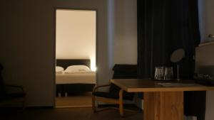 Voodi või voodid majutusasutuse Hotel Bílý Koníček toas
