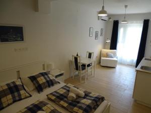 Posteľ alebo postele v izbe v ubytovaní Job studio apartments