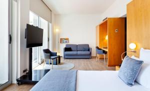 A seating area at Hotel Condes de Barcelona