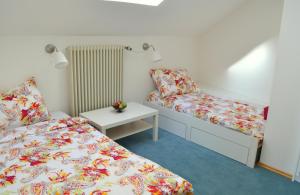 Un pat sau paturi într-o cameră la Haus Seegarten