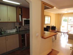 Η κουζίνα ή μικρή κουζίνα στο Torreon del Mar Apartment
