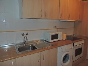 Kuchyň nebo kuchyňský kout v ubytování Apartamento céntrico con WIFI en Biescas