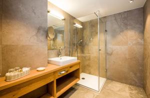 Kúpeľňa v ubytovaní Wellness & Sporthotel Alpenhof