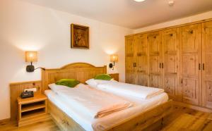 Posteľ alebo postele v izbe v ubytovaní Wellness & Sporthotel Alpenhof