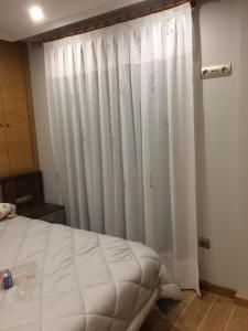 A bed or beds in a room at Illas Atlanticas