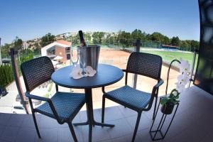 Balkón nebo terasa v ubytování Penzion Tenis HTK