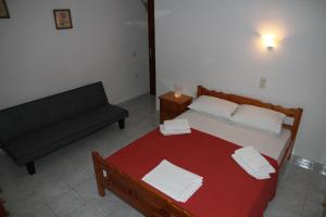 Postel nebo postele na pokoji v ubytování Kondilw Rooms