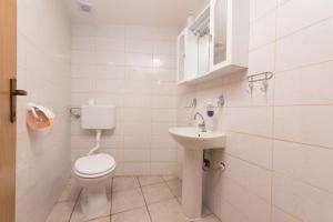 Koupelna v ubytování Apartman Sigurnjak