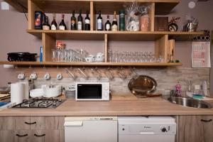 Kuchyň nebo kuchyňský kout v ubytování Apartman Sigurnjak