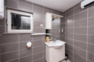 Koupelna v ubytování Apartman Sigurnjak