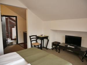 Et tv og/eller underholdning på Sibiu City Center Apartments