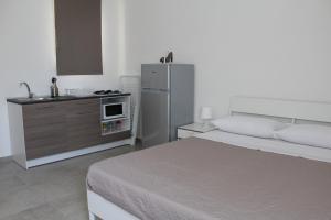 Dapur atau dapur kecil di Bahia Negra Case Vacanza