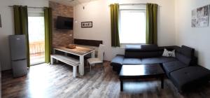 Posezení v ubytování Ferienwohnung Alpklang