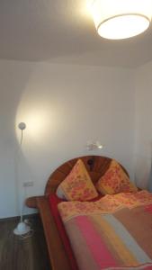 Postel nebo postele na pokoji v ubytování Ferienwohnung Ol Komede Wai 12c + 1 fotografie