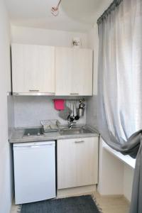 Kuchyň nebo kuchyňský kout v ubytování Apartments Knezgrad