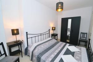 Postel nebo postele na pokoji v ubytování Apartments Knezgrad