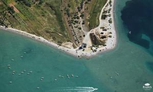 an aerial view of a beach with boats in the water at Apartments Paklenica in Starigrad