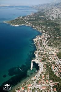 an aerial view of a city and a body of water at Apartments Paklenica in Starigrad-Paklenica