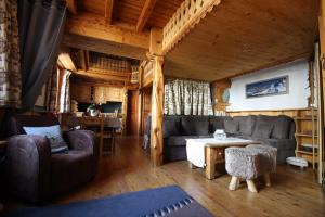 Posezení v ubytování Appartement duplex de charme hyper centre à Val d'Isère