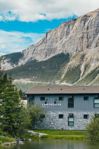 a building on the side of a mountain at Lamphouse By Basecamp in Canmore