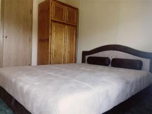 Postel nebo postele na pokoji v ubytování Sunny Paradise