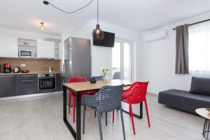 Kuchyň nebo kuchyňský kout v ubytování Apartments Kiara