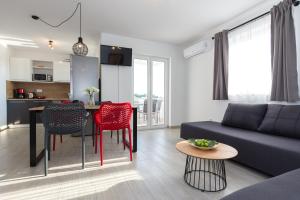 Kuchyň nebo kuchyňský kout v ubytování Apartments Kiara