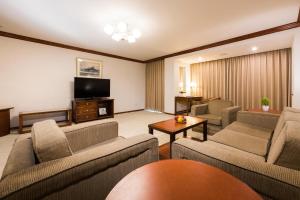 TV a/nebo společenská místnost v ubytování Hotel Tainan